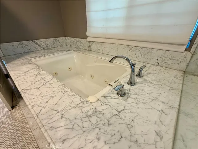 a bathroom with a bathtub