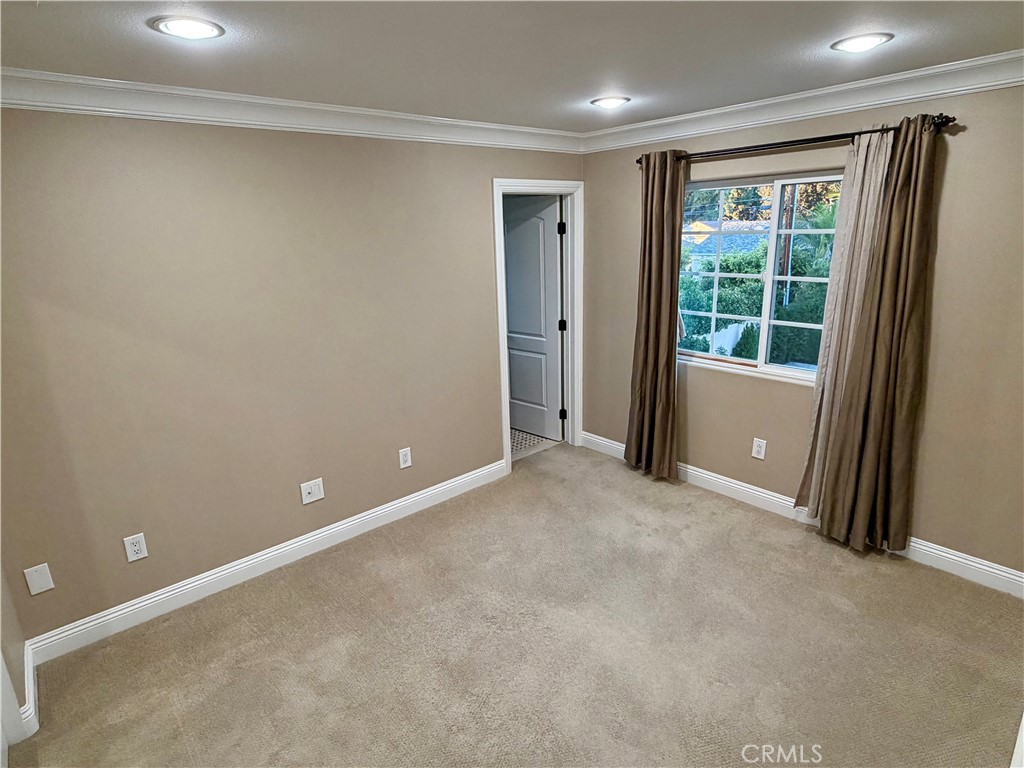 5243 East Arbor Road Long Beach, CA 90808 - Photo 28 of 46 a view of an empty room with a window