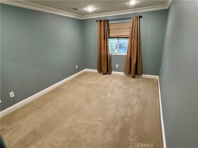 a view of an empty room with window