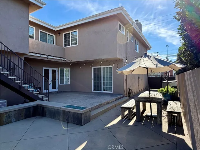 a view of house with a chairs and table in kitchen