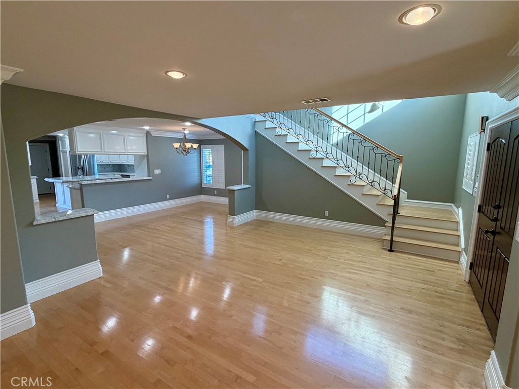 5243 East Arbor Road Long Beach, CA 90808 - Photo 7 of 46 a view of entryway and hall with wooden floor
