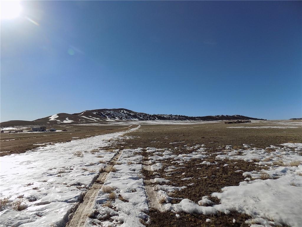 6287 Larimer Road Hartsel, CO 80449 - Photo 3 of 7 a view of lake and mountain