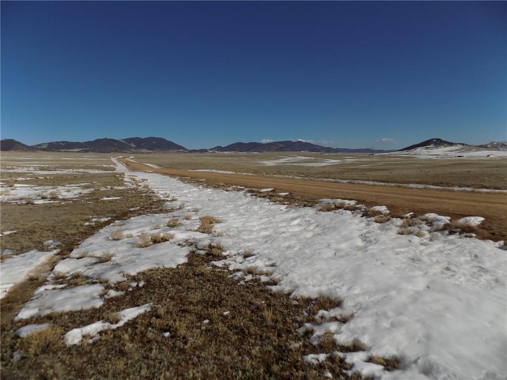 6287 Larimer Road Hartsel, CO 80449 - Photo 5 of 7 a view of an ocean in a mountain