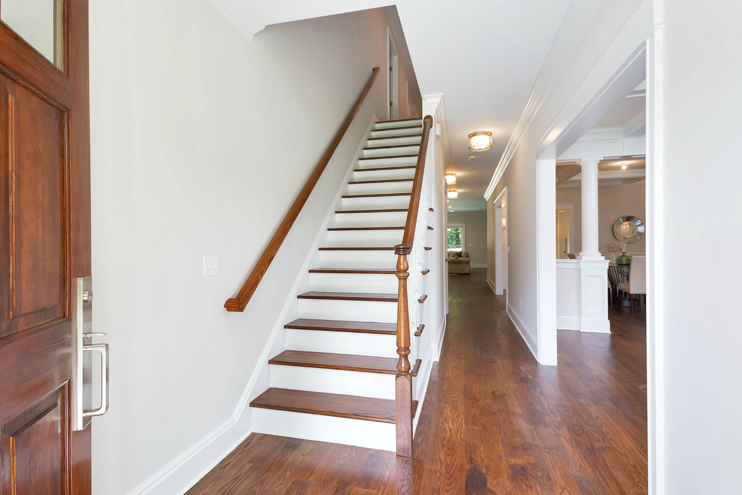18 Edgewood Road Darien, CT 06820 - Photo 3 of 38 a view of a hallway with wooden floor and entryway