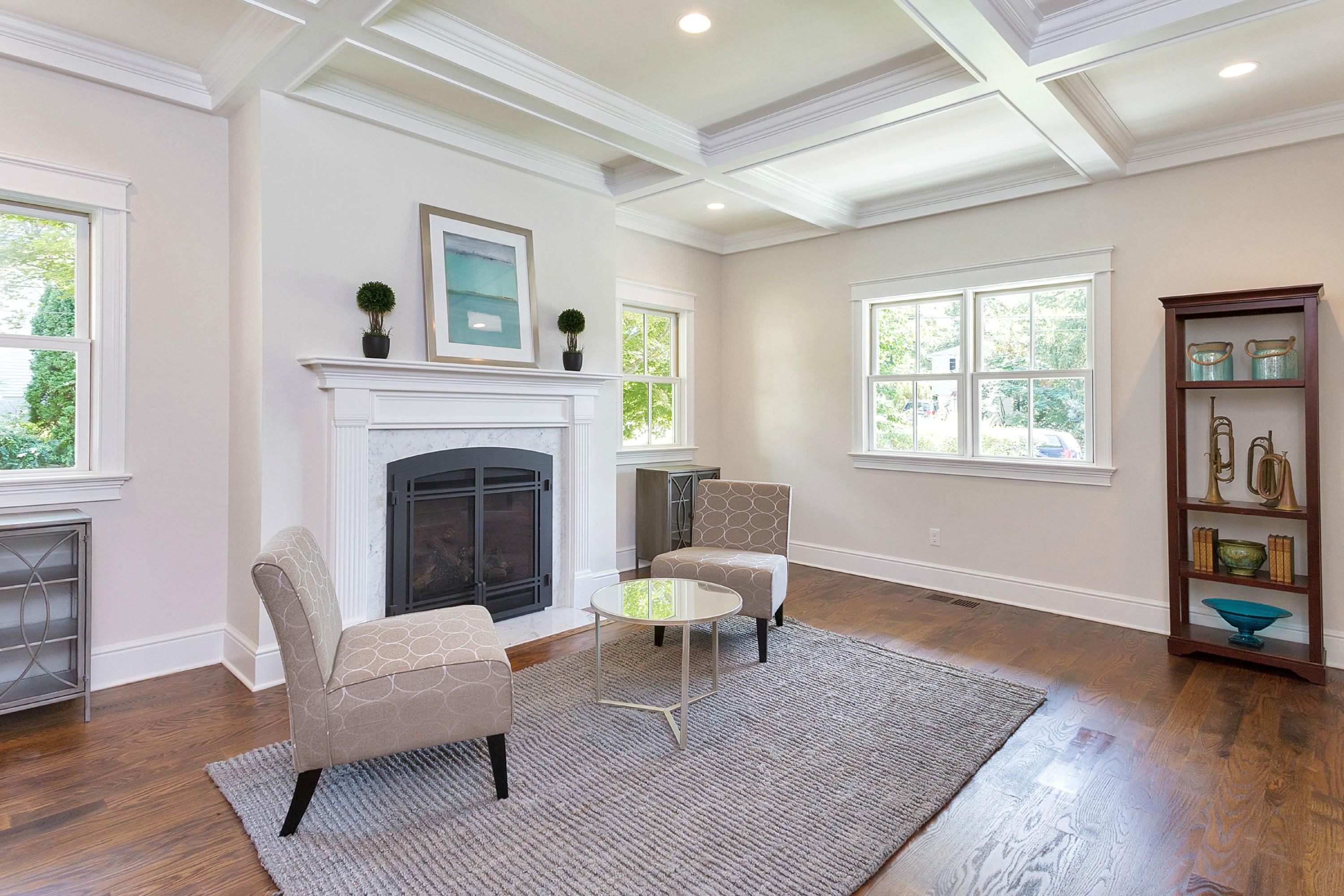 18 Edgewood Road Darien, CT 06820 - Photo 5 of 38 a living room with furniture and a fireplace