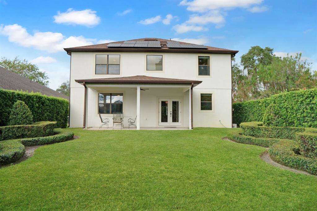 124 Spring Glen Drive DeBary, FL 32713 - Photo 34 of 40 front view of a house with a yard