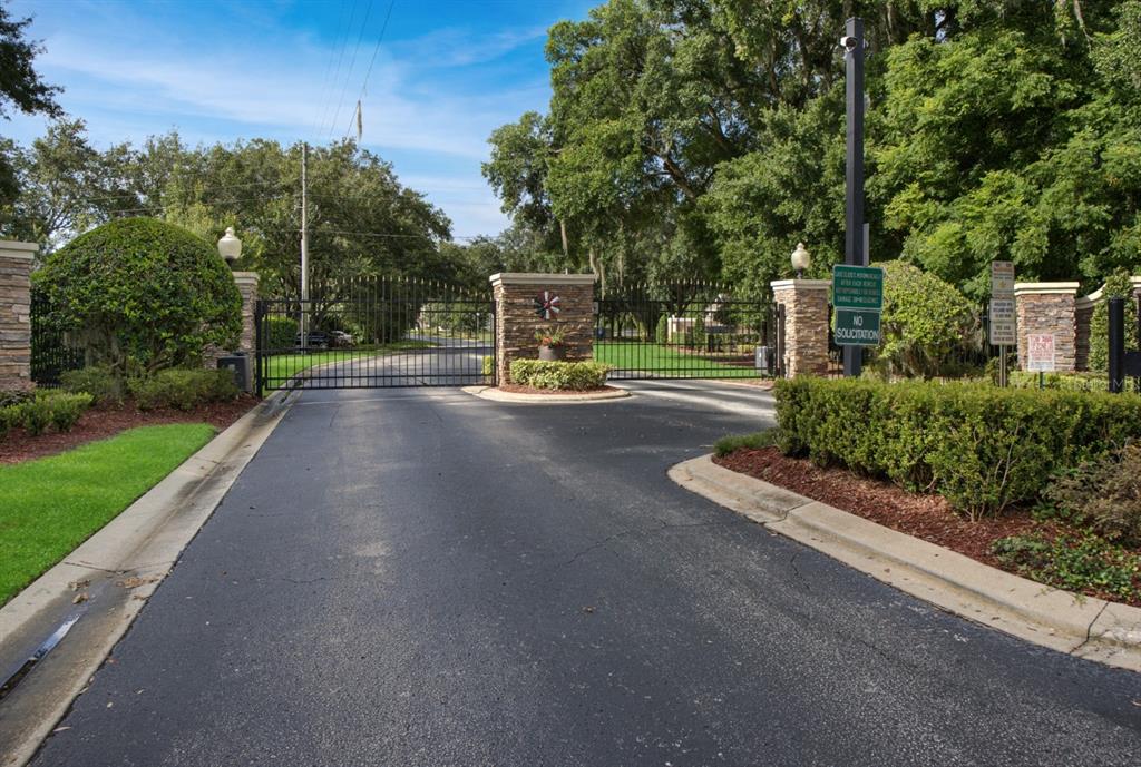 124 Spring Glen Drive DeBary, FL 32713 - Photo 39 of 40 a view of a street with a bench and trees