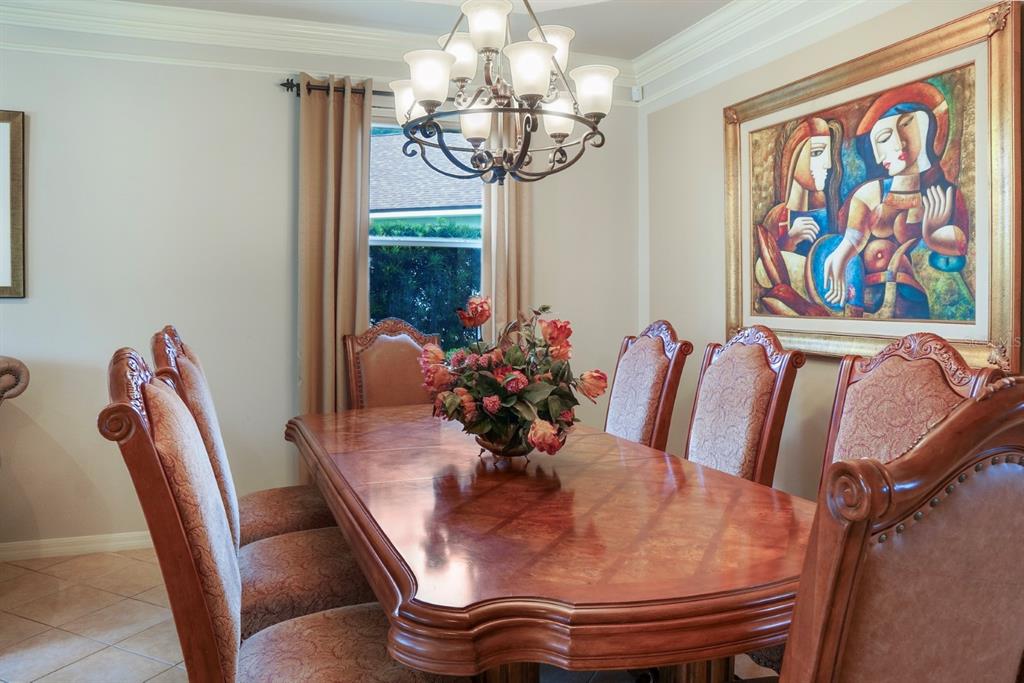 124 Spring Glen Drive DeBary, FL 32713 - Photo 10 of 40 a view of a dining room with furniture