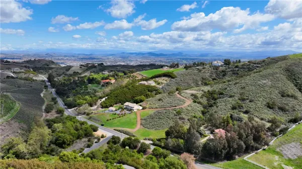 a view of a city with mountains in the background