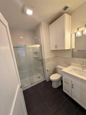 a view of an empty walk in closet