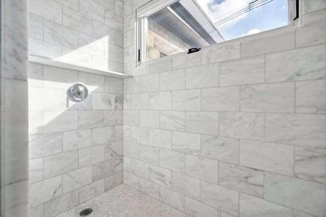 a view of a chairs and table in a patio