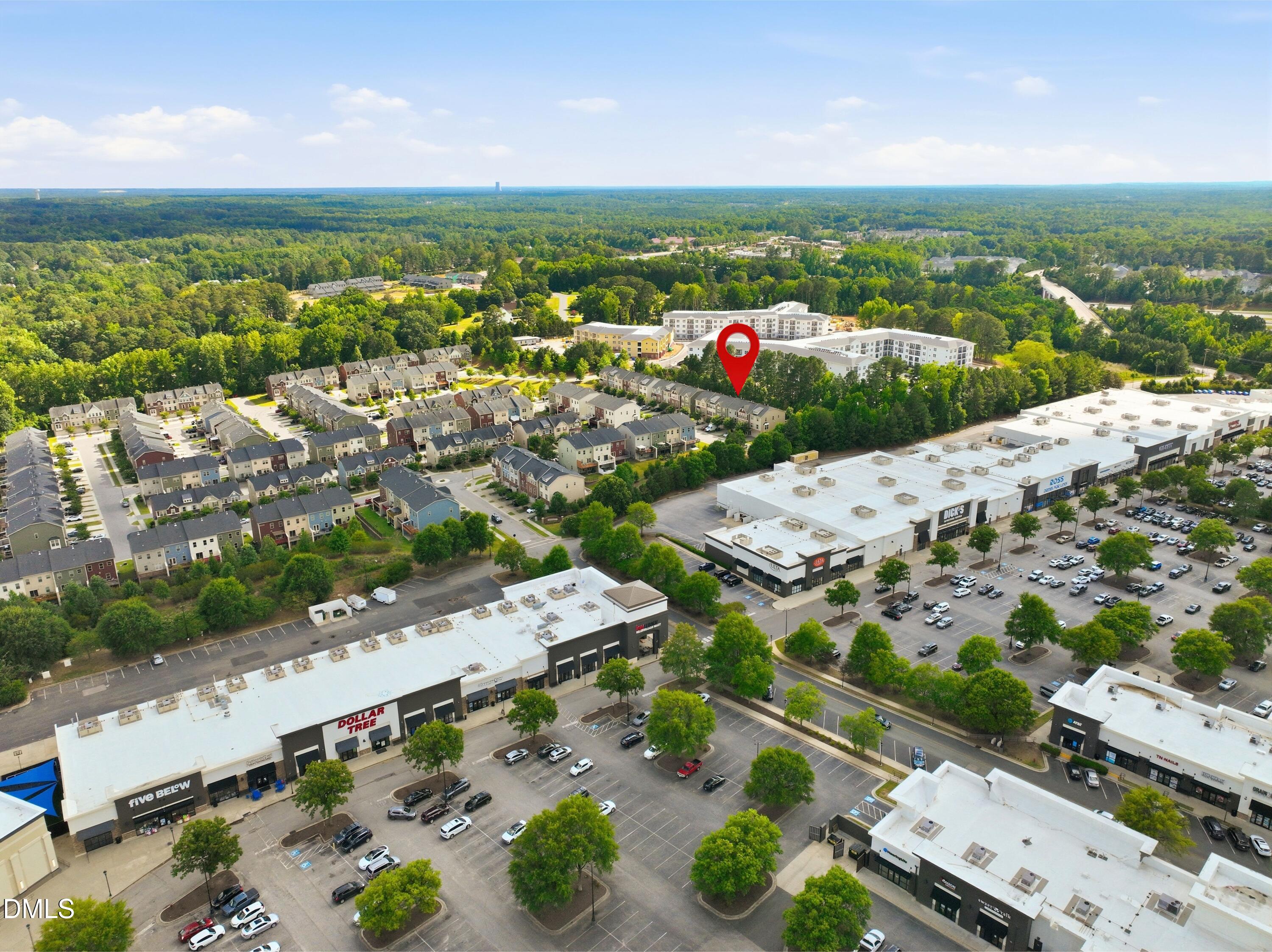 1004 Waymaker Court Apex, NC 27502 - Photo 30 of 30 an aerial view of a city with lots of residential buildings ocean and mountain view in back