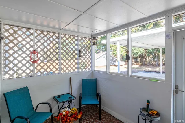 a room with furniture and a window