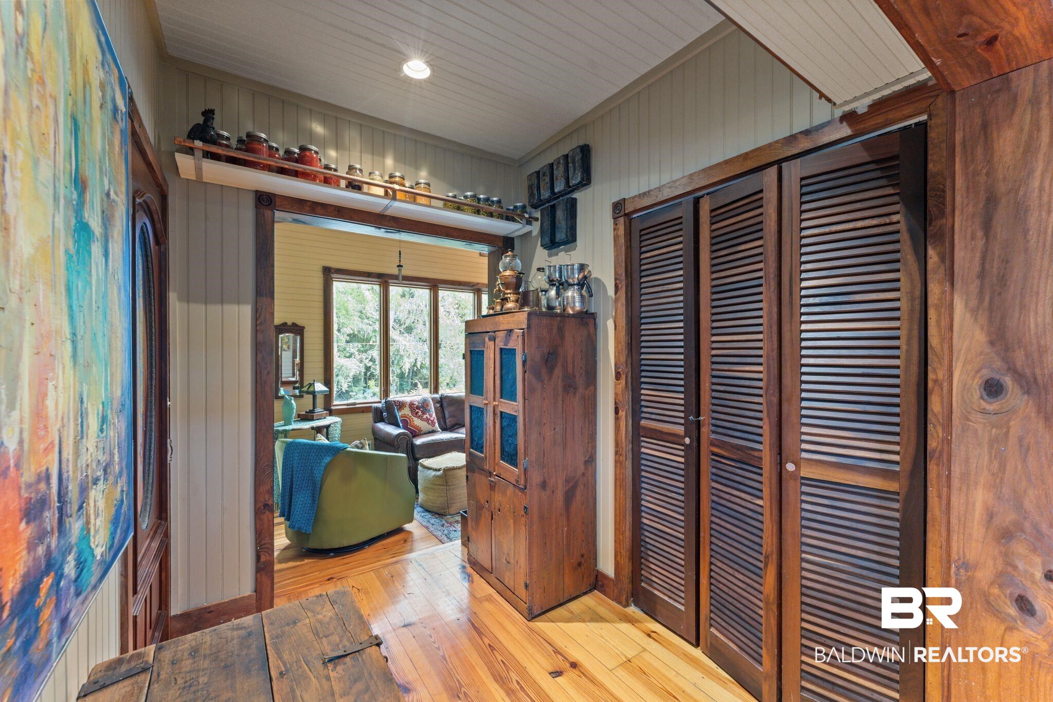 16451 Honey Road Summerdale, AL 36580 - Photo 24 of 55 Hallway with hardwood / wood-style floors, recessed lighting, and wood walls