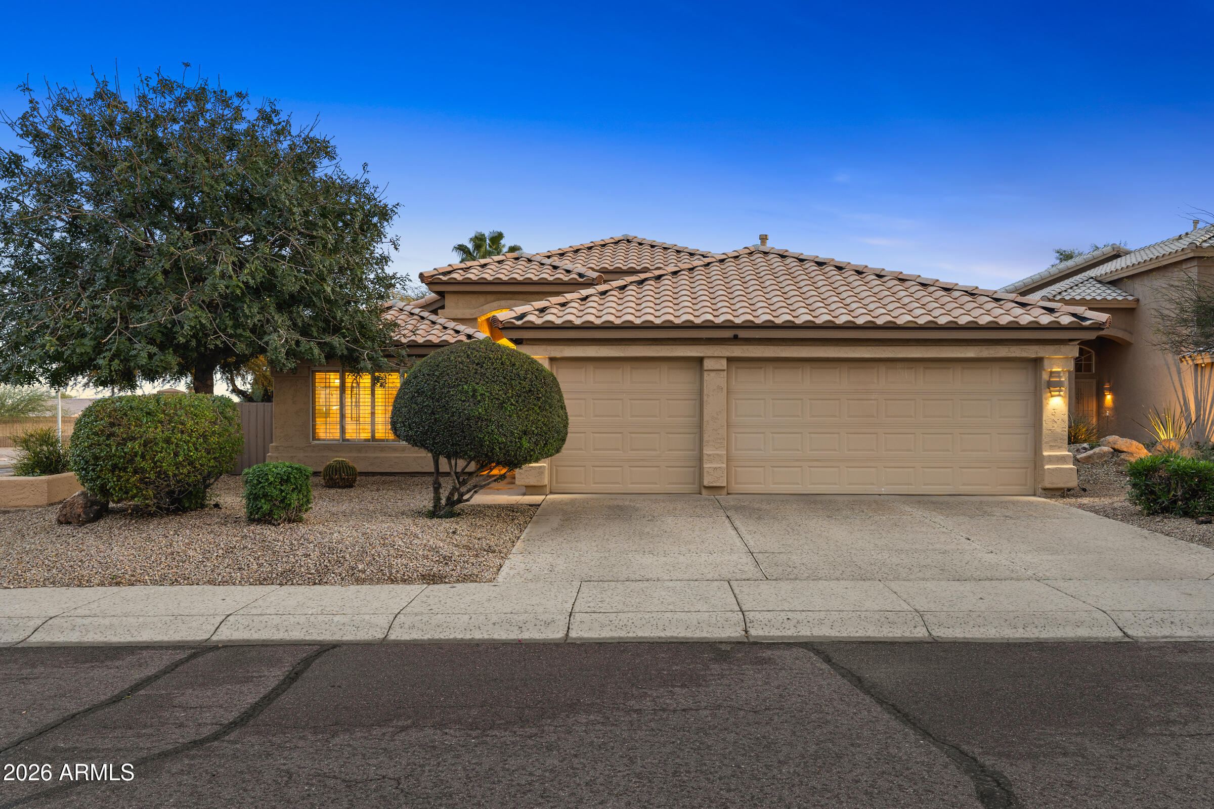 4629 East Gold Poppy Way Phoenix, AZ 85044 - Photo 1 of 46 a front view of a house