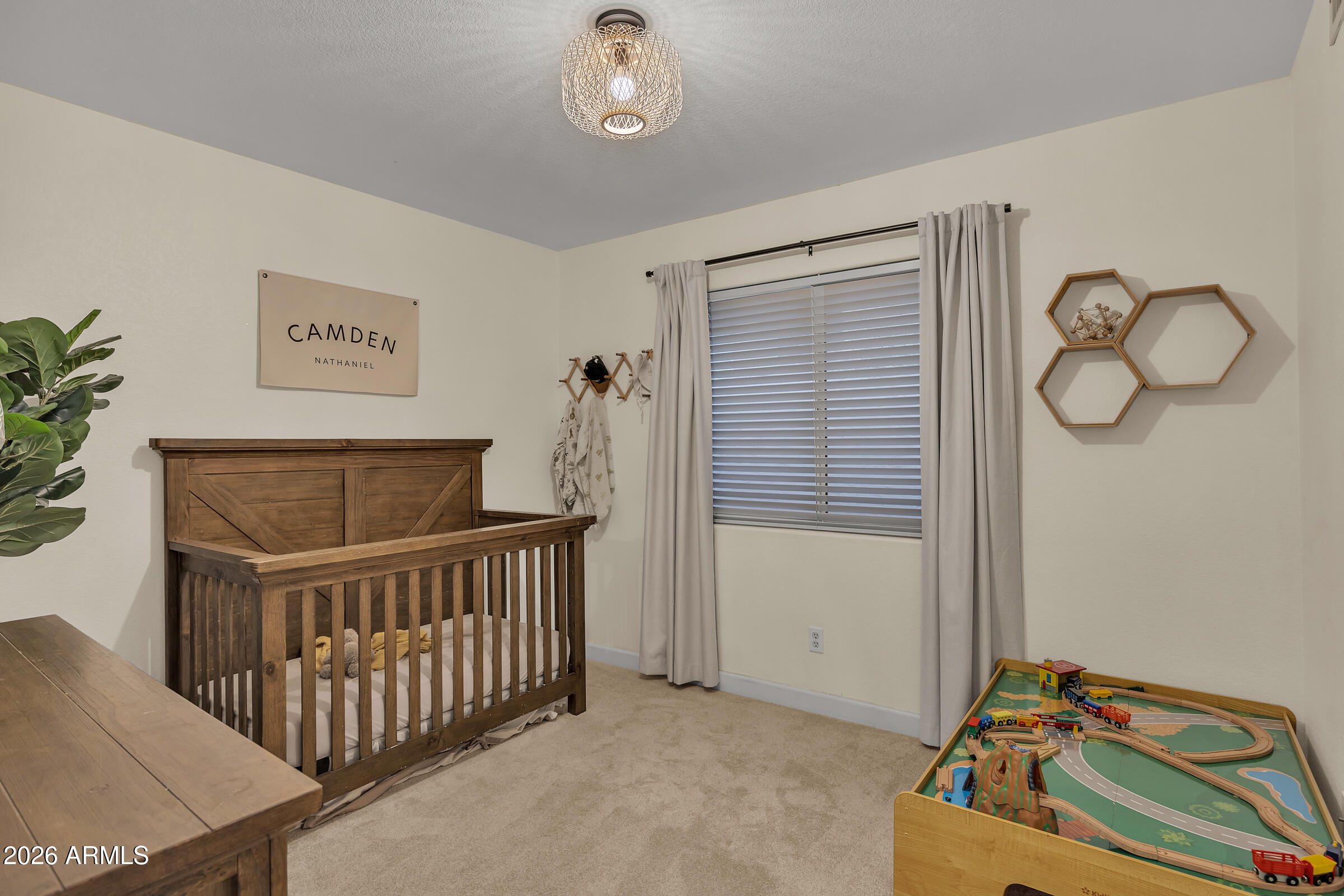 4629 East Gold Poppy Way Phoenix, AZ 85044 - Photo 20 of 46 a bedroom with a bed and window