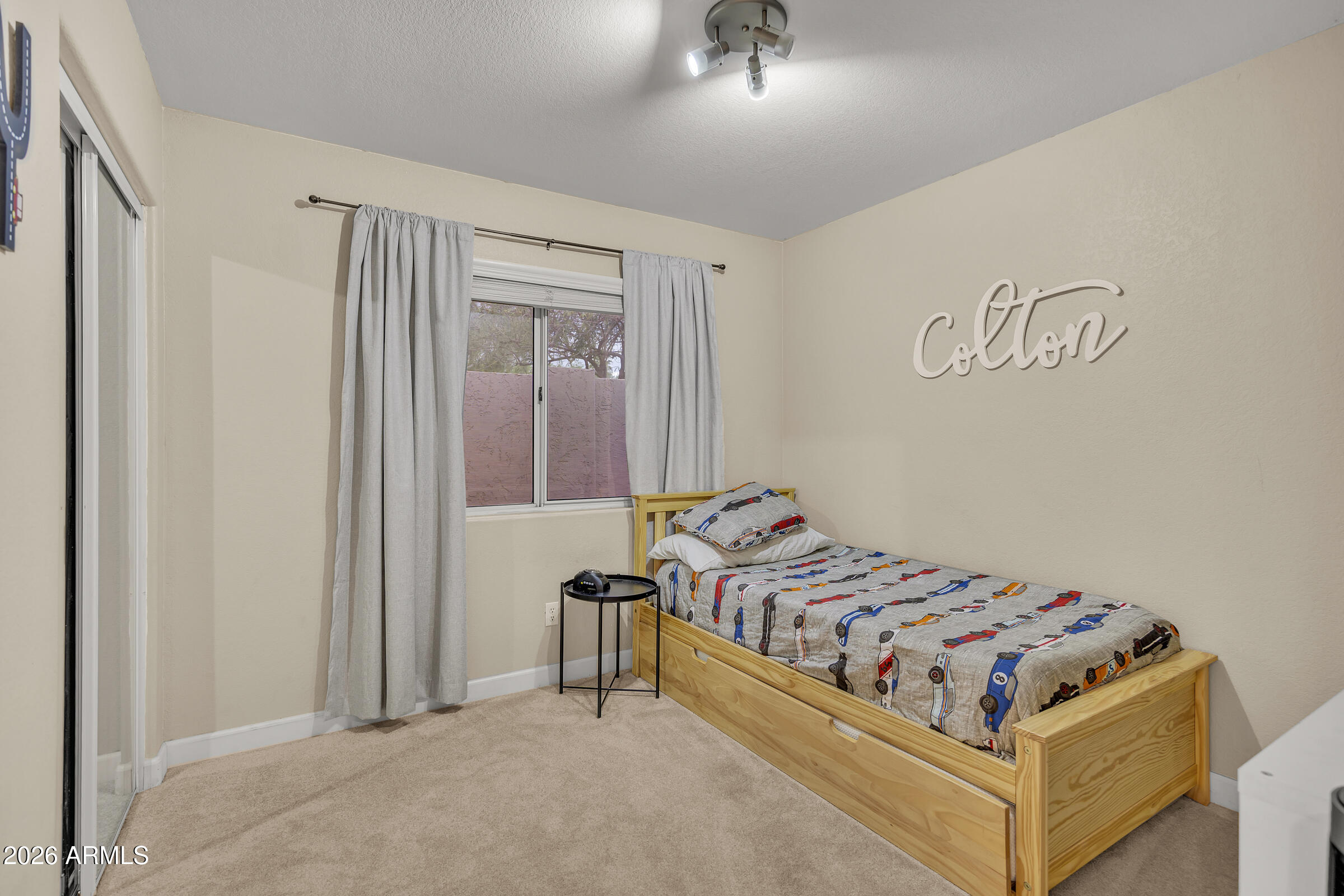 4629 East Gold Poppy Way Phoenix, AZ 85044 - Photo 21 of 46 a bedroom with a bed and a window
