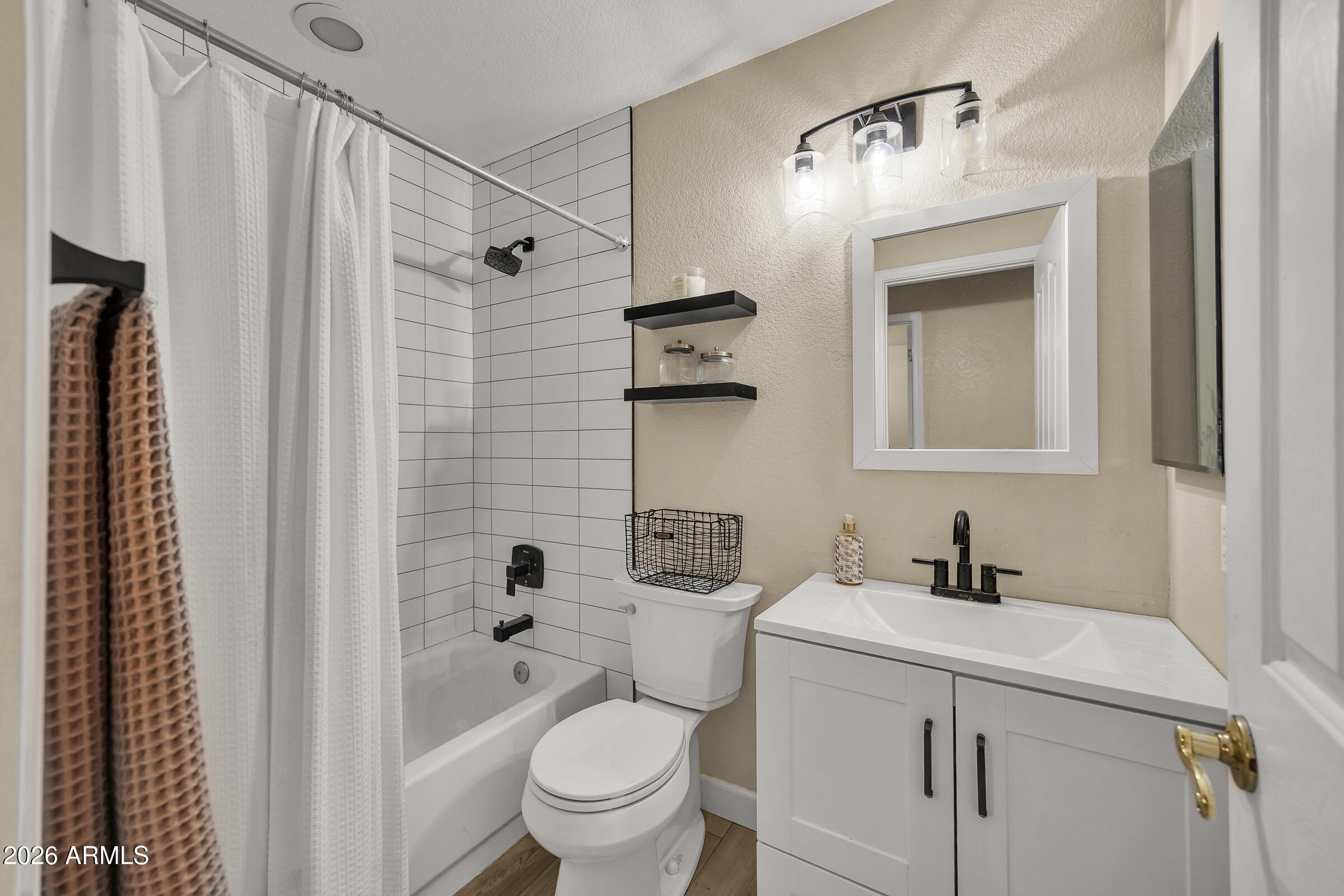 4629 East Gold Poppy Way Phoenix, AZ 85044 - Photo 22 of 46 a bathroom with a sink a toilet and shower