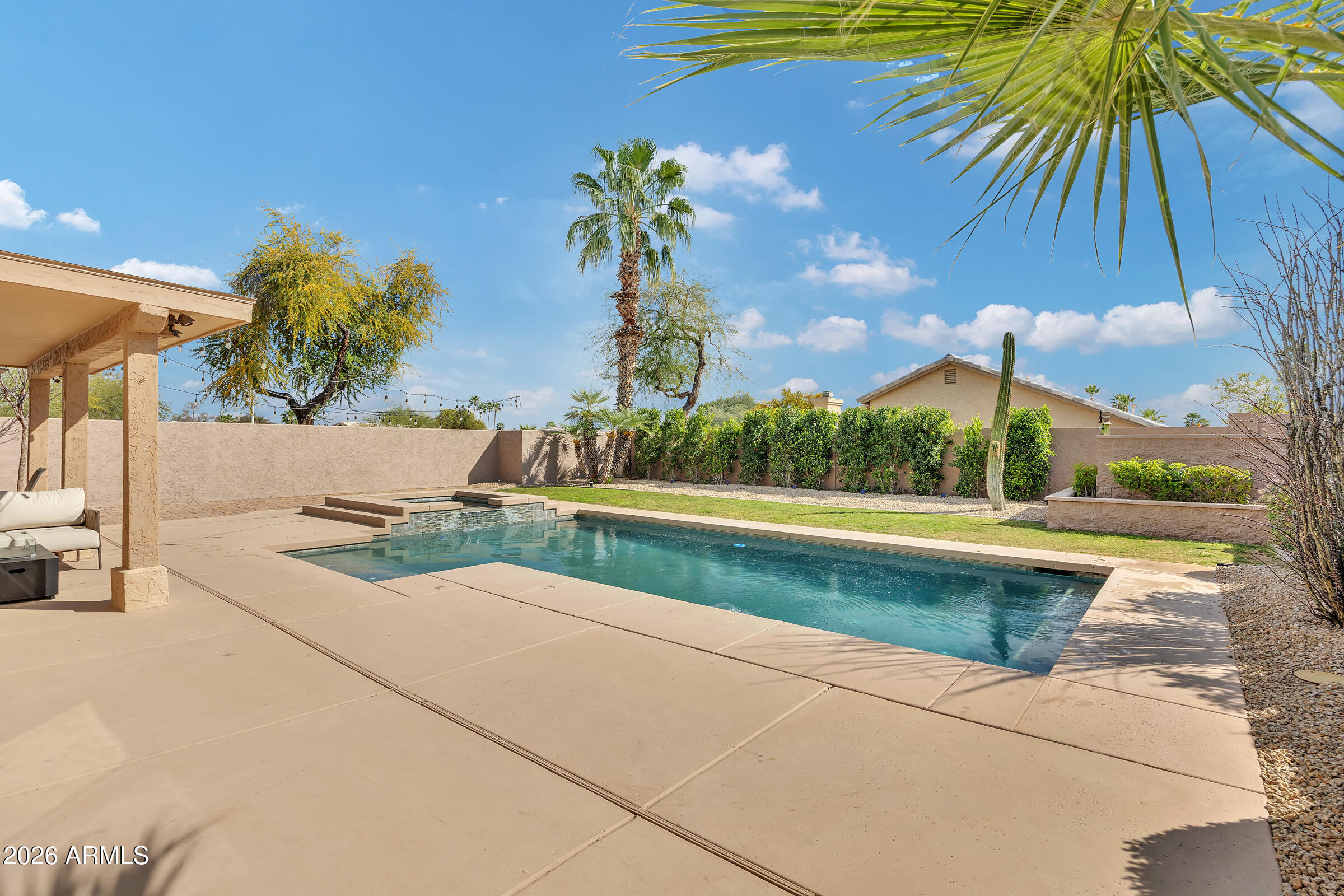 4629 East Gold Poppy Way Phoenix, AZ 85044 - Photo 26 of 46 a view of swimming pool with a yard