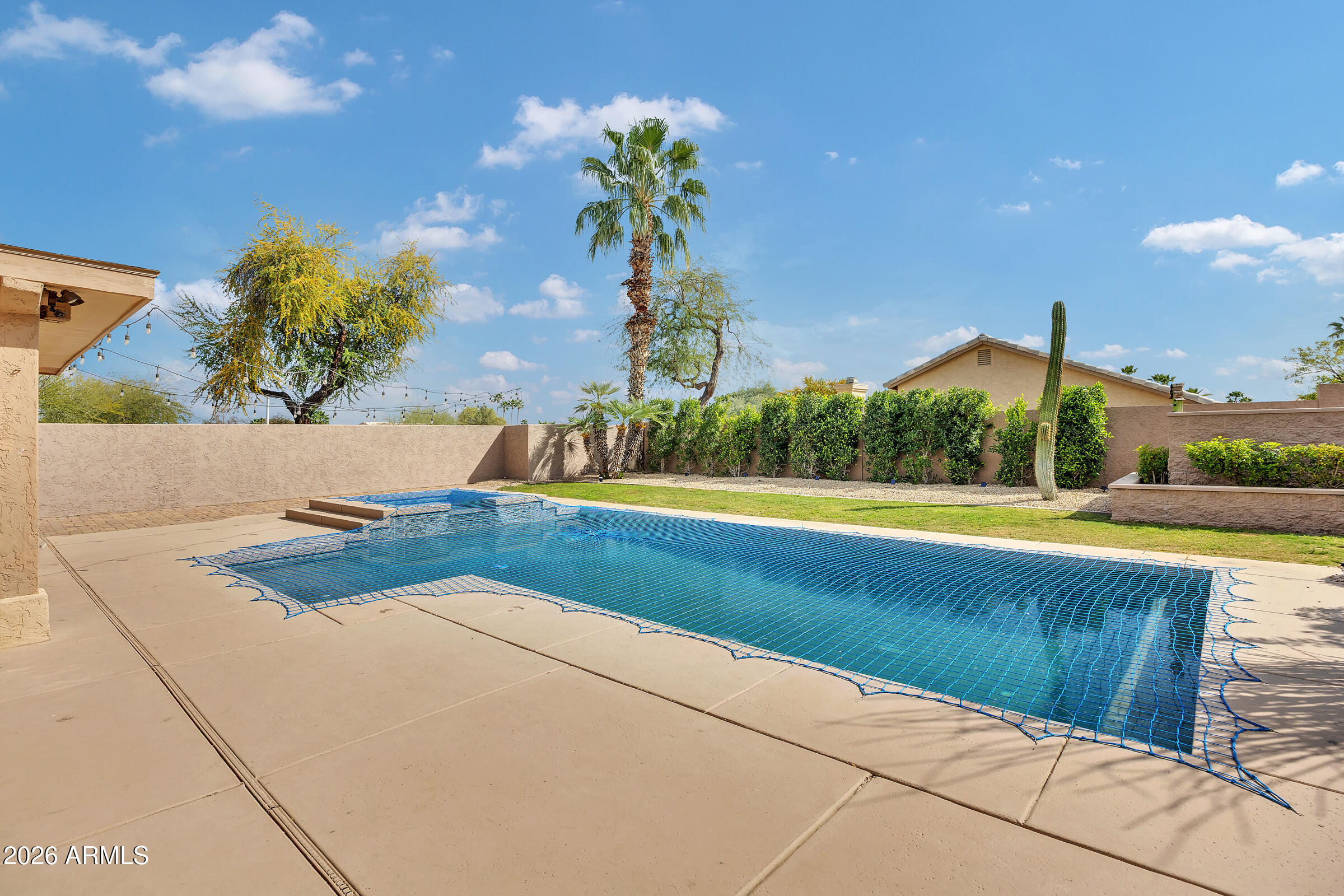 4629 East Gold Poppy Way Phoenix, AZ 85044 - Photo 27 of 46 a view of outdoor space and swimming pool