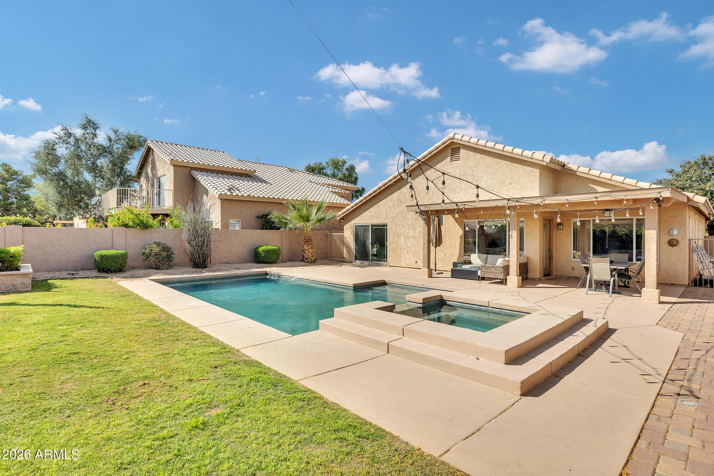 4629 East Gold Poppy Way Phoenix, AZ 85044 - Photo 29 of 46 a view of a house with backyard and sitting area