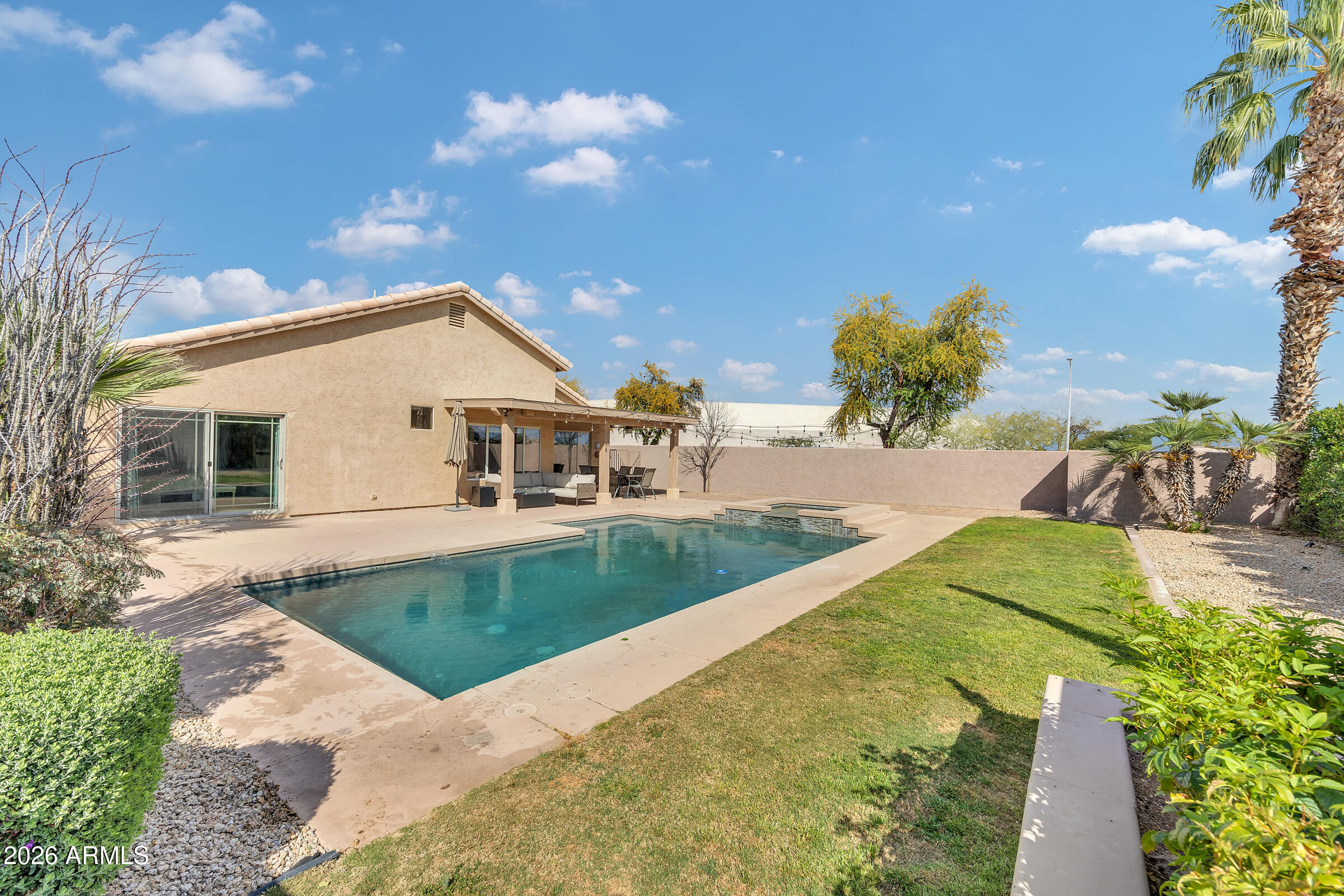 4629 East Gold Poppy Way Phoenix, AZ 85044 - Photo 31 of 46 a view of a backyard of the house
