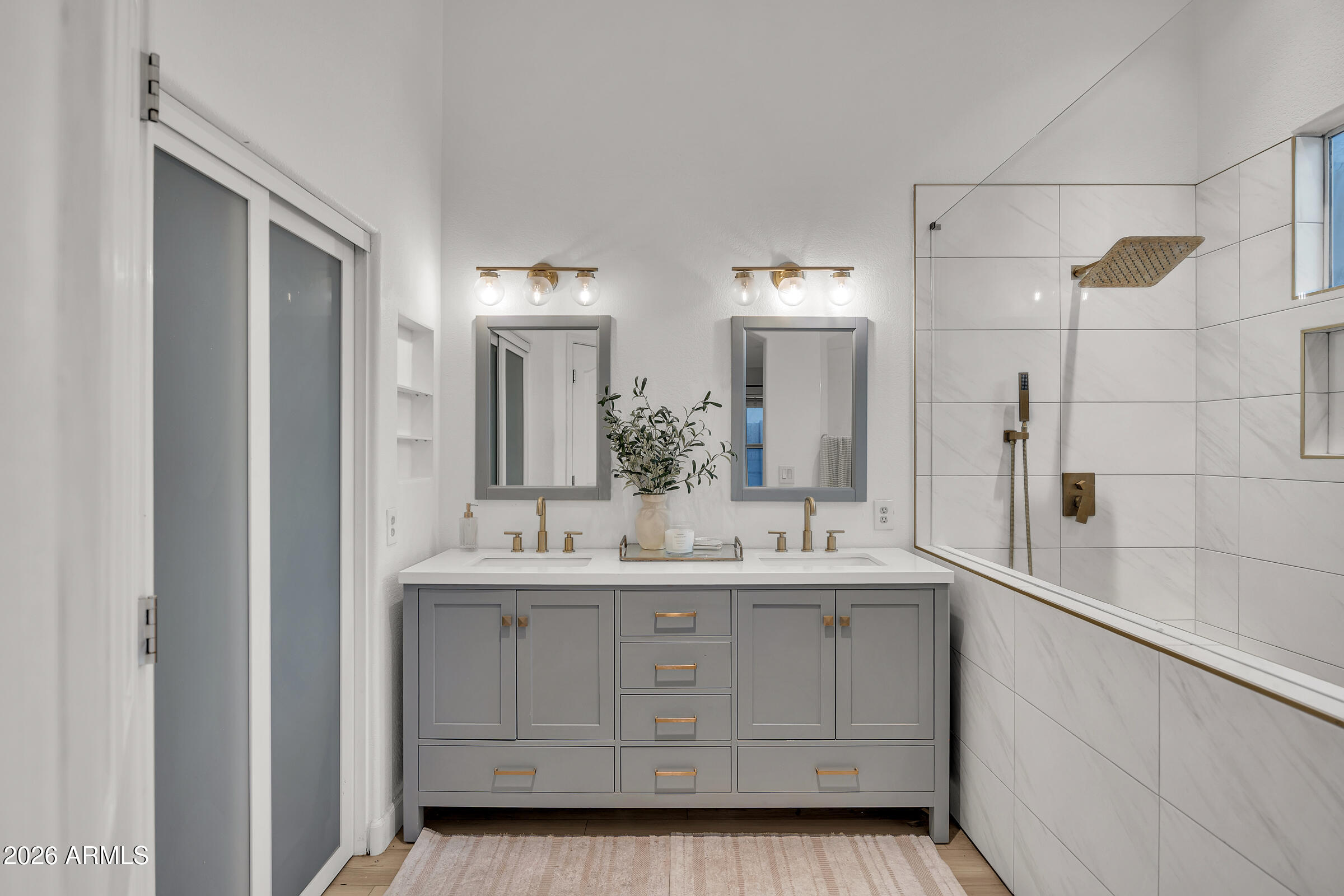 4629 East Gold Poppy Way Phoenix, AZ 85044 - Photo 4 of 46 a bathroom with a double vanity sink mirror and double