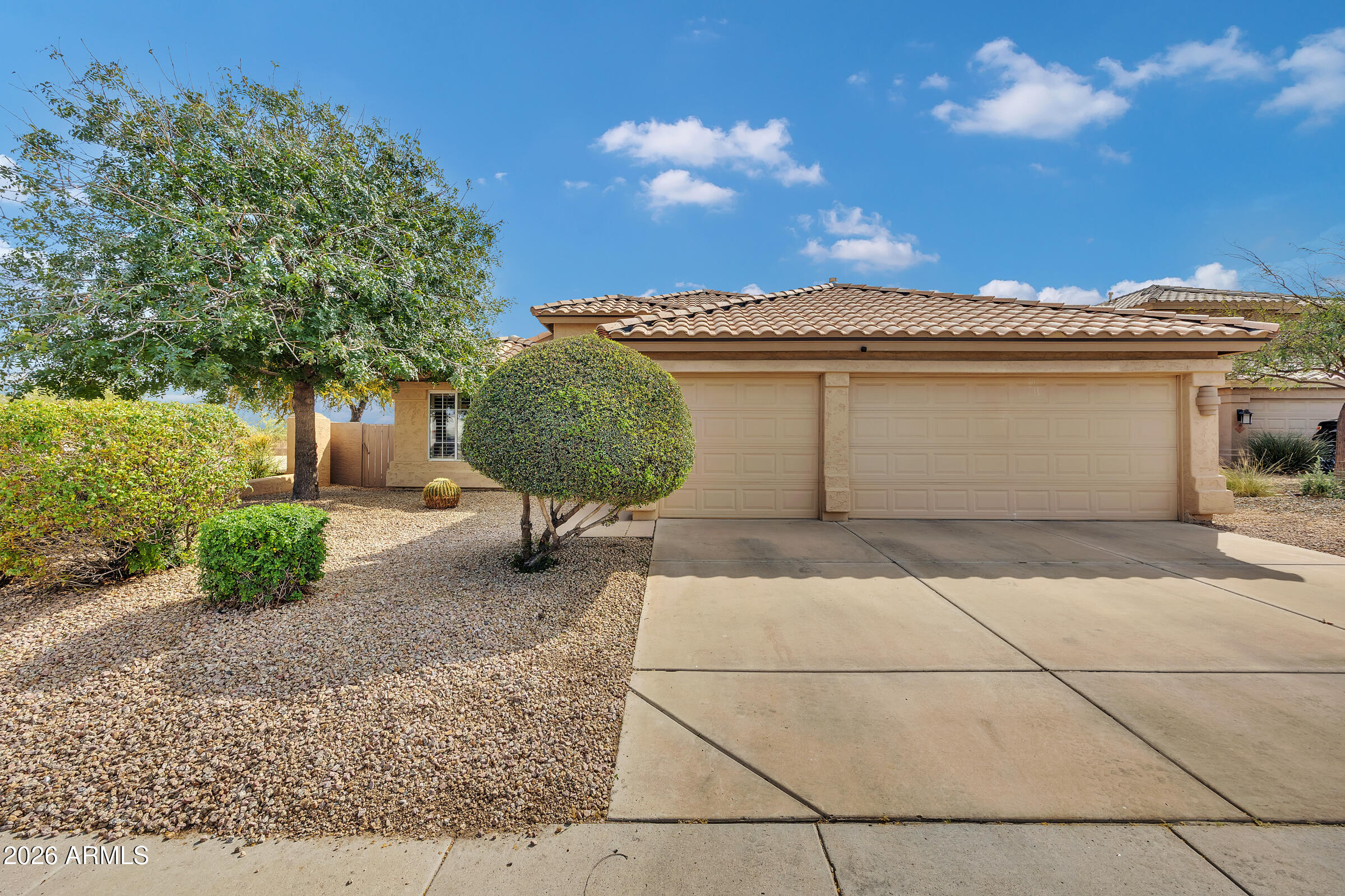 4629 East Gold Poppy Way Phoenix, AZ 85044 - Photo 40 of 46 a front view of a house