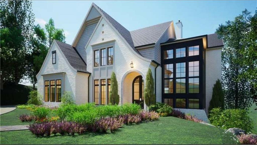462 Emily Reed Lane Atlanta, GA 30342 - Photo 2 of 4 a front view of a house with garden
