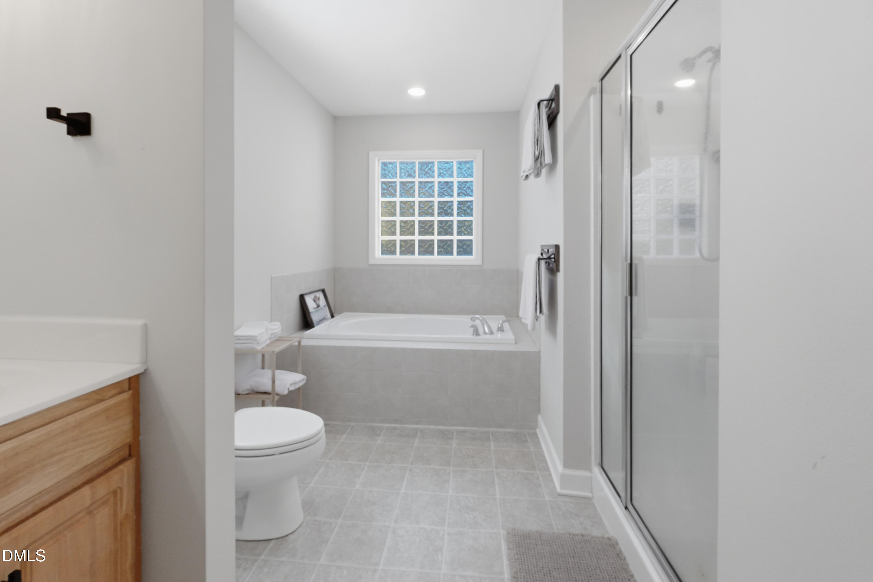 2097 Satterwhite Road Oxford, NC 27565 - Photo 16 of 40 a bathroom with a toilet and a bathtub