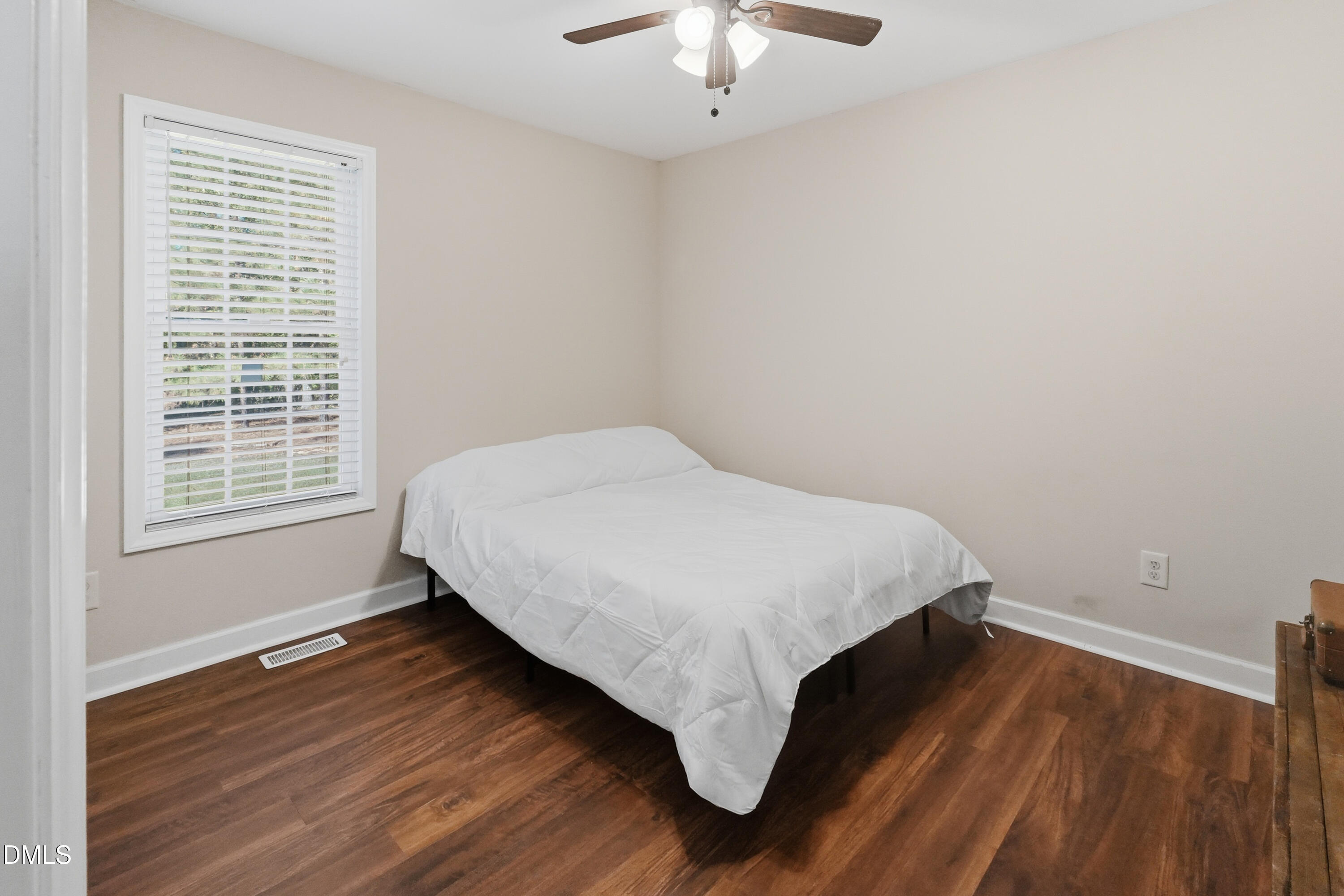 2097 Satterwhite Road Oxford, NC 27565 - Photo 20 of 40 a bedroom with a bed and a window