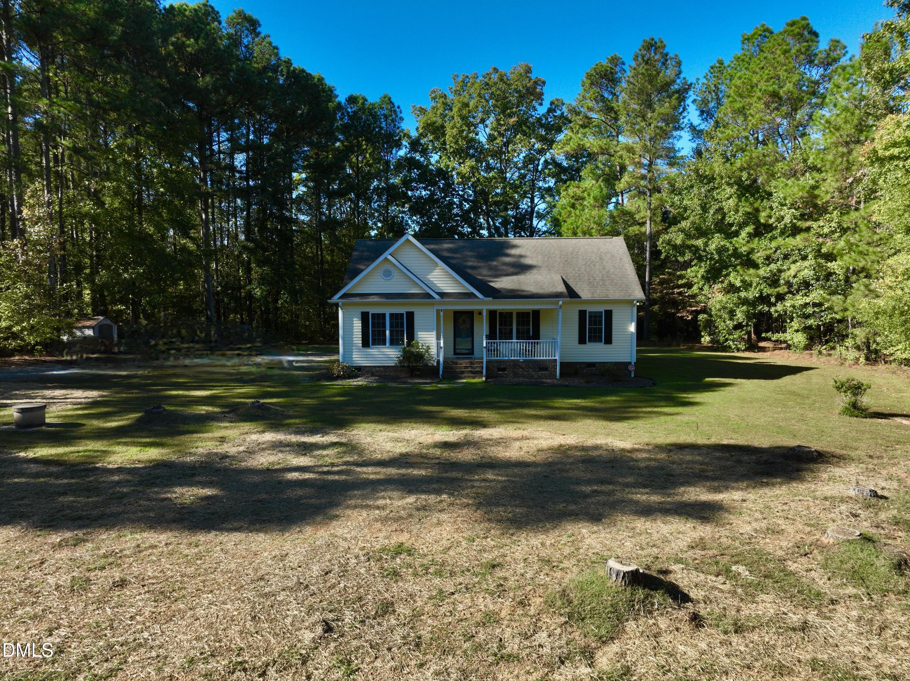 2097 Satterwhite Road Oxford, NC 27565 - Photo 23 of 40 a front view of a house with a yard