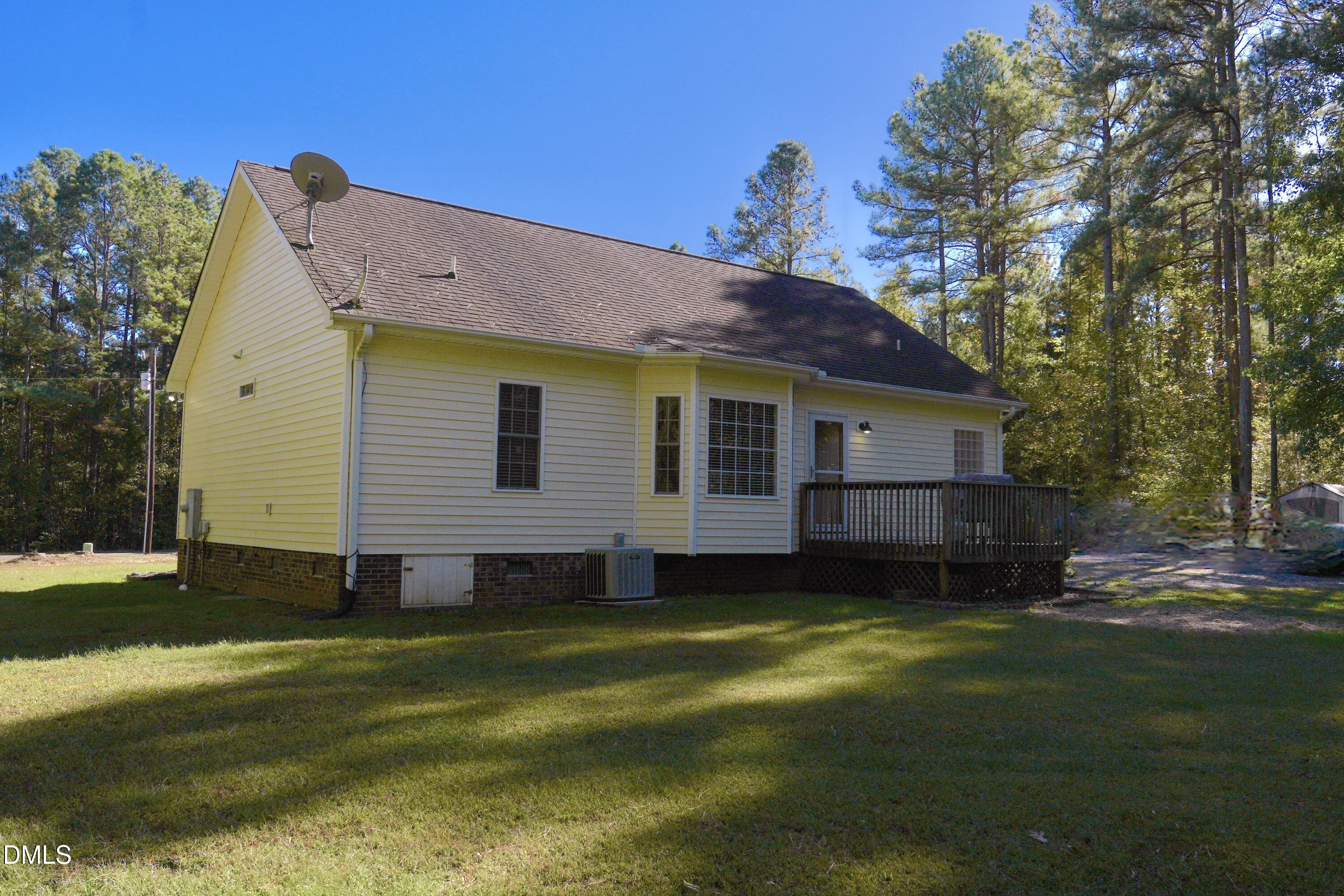 2097 Satterwhite Road Oxford, NC 27565 - Photo 24 of 40 a view of a house with a yard