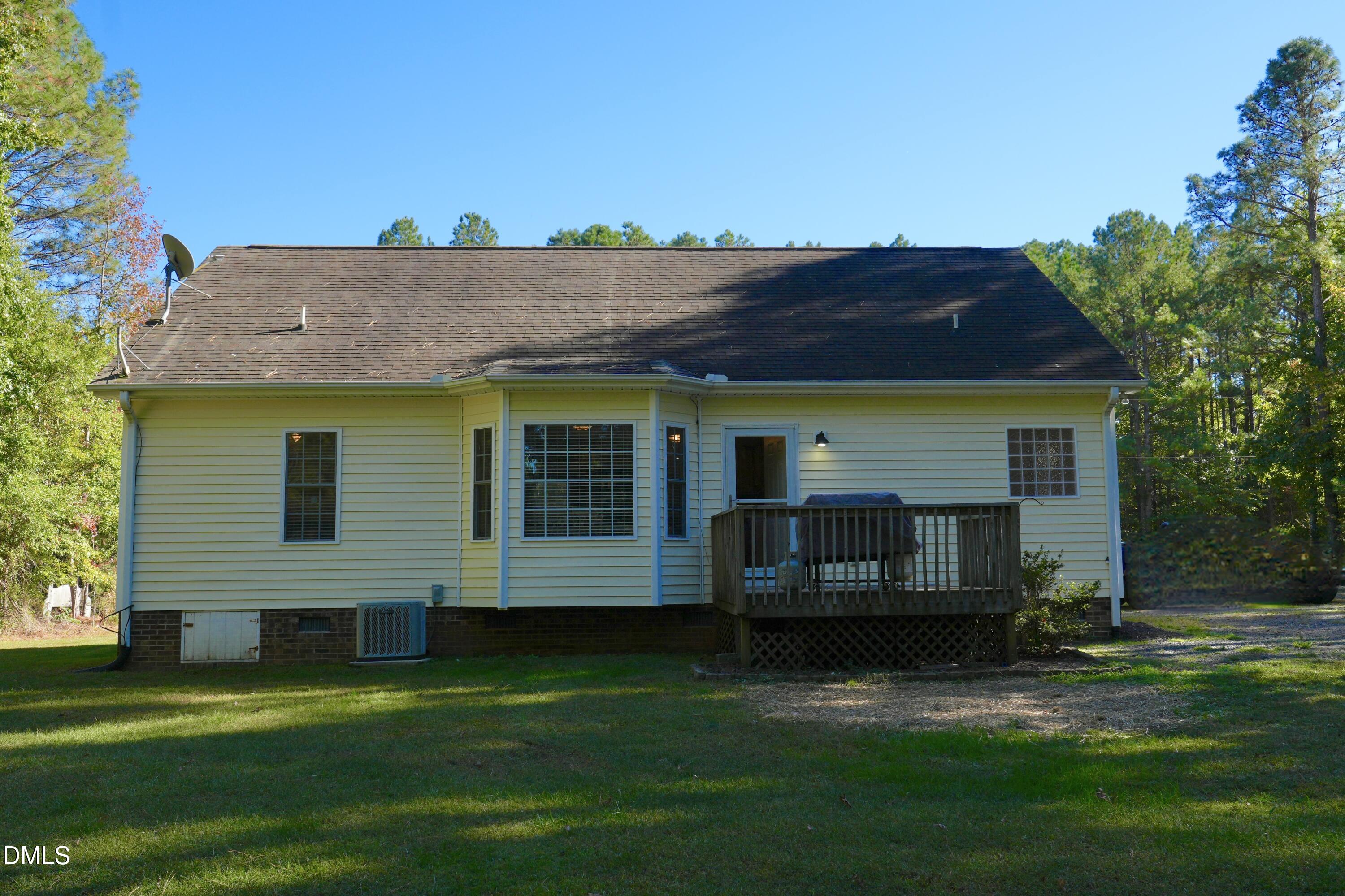2097 Satterwhite Road Oxford, NC 27565 - Photo 25 of 40 a view of a house with a yard