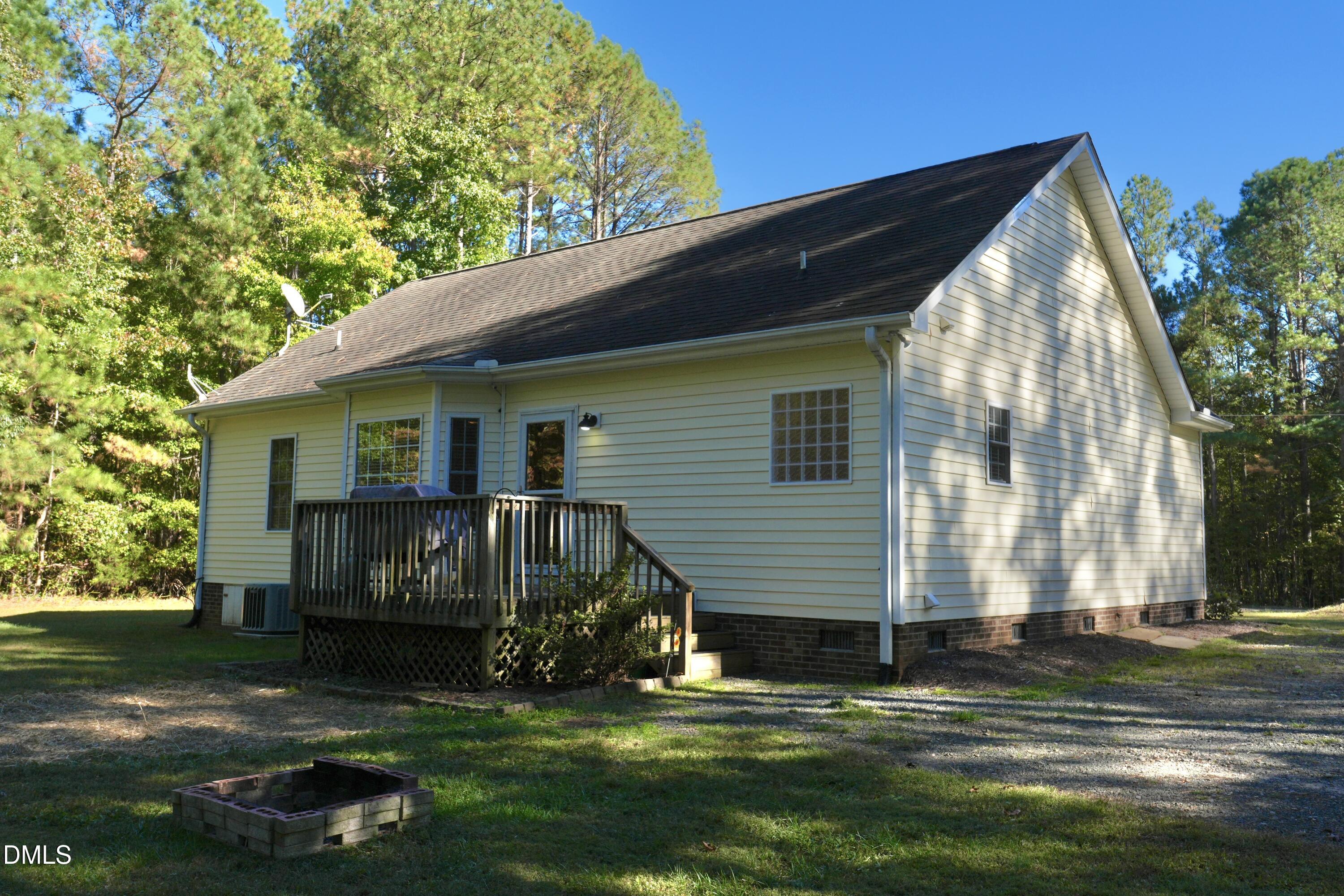 2097 Satterwhite Road Oxford, NC 27565 - Photo 26 of 40 a view of a house with backyard and sitting area