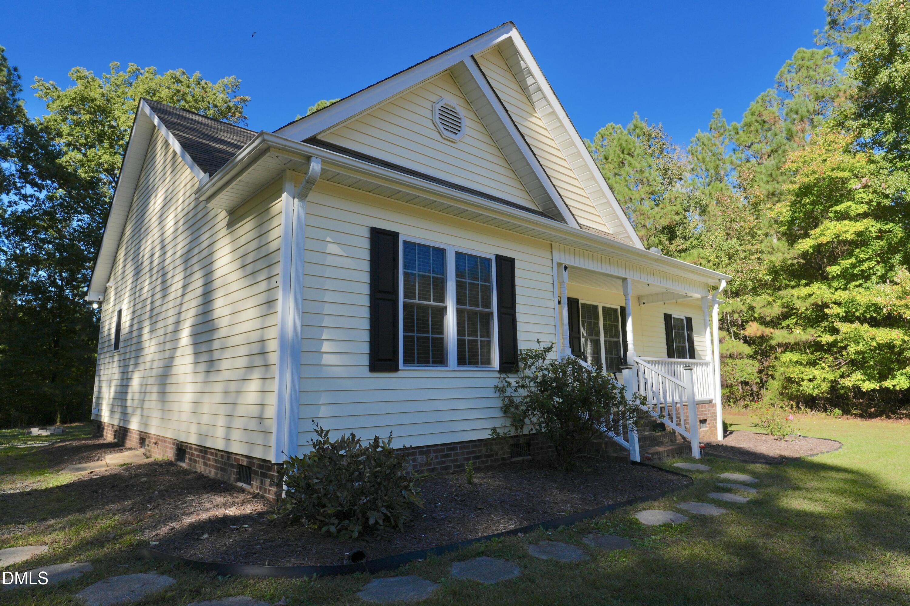 2097 Satterwhite Road Oxford, NC 27565 - Photo 28 of 40 a view of house with backyard