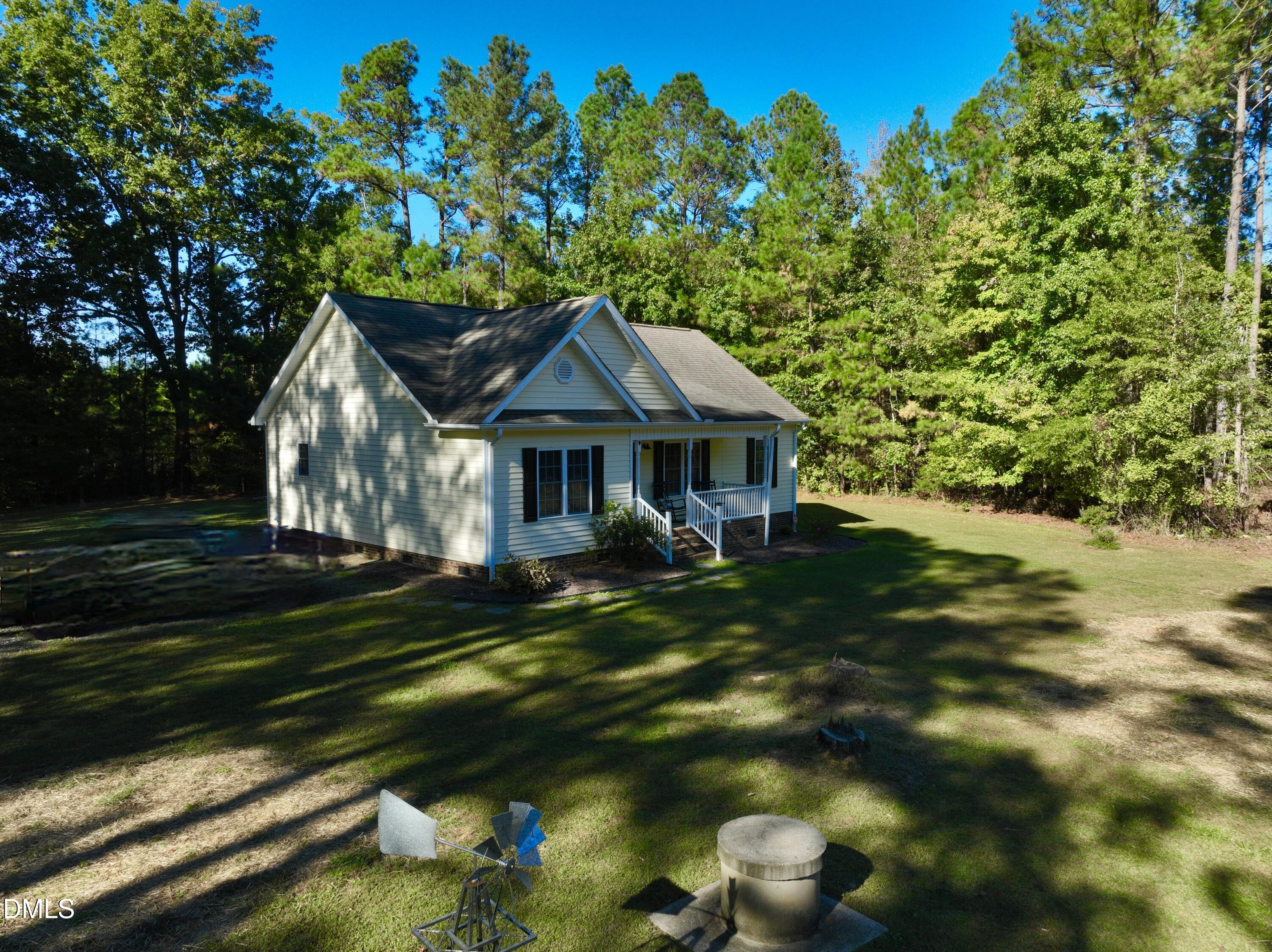 2097 Satterwhite Road Oxford, NC 27565 - Photo 30 of 40 a front view of a house with a yard