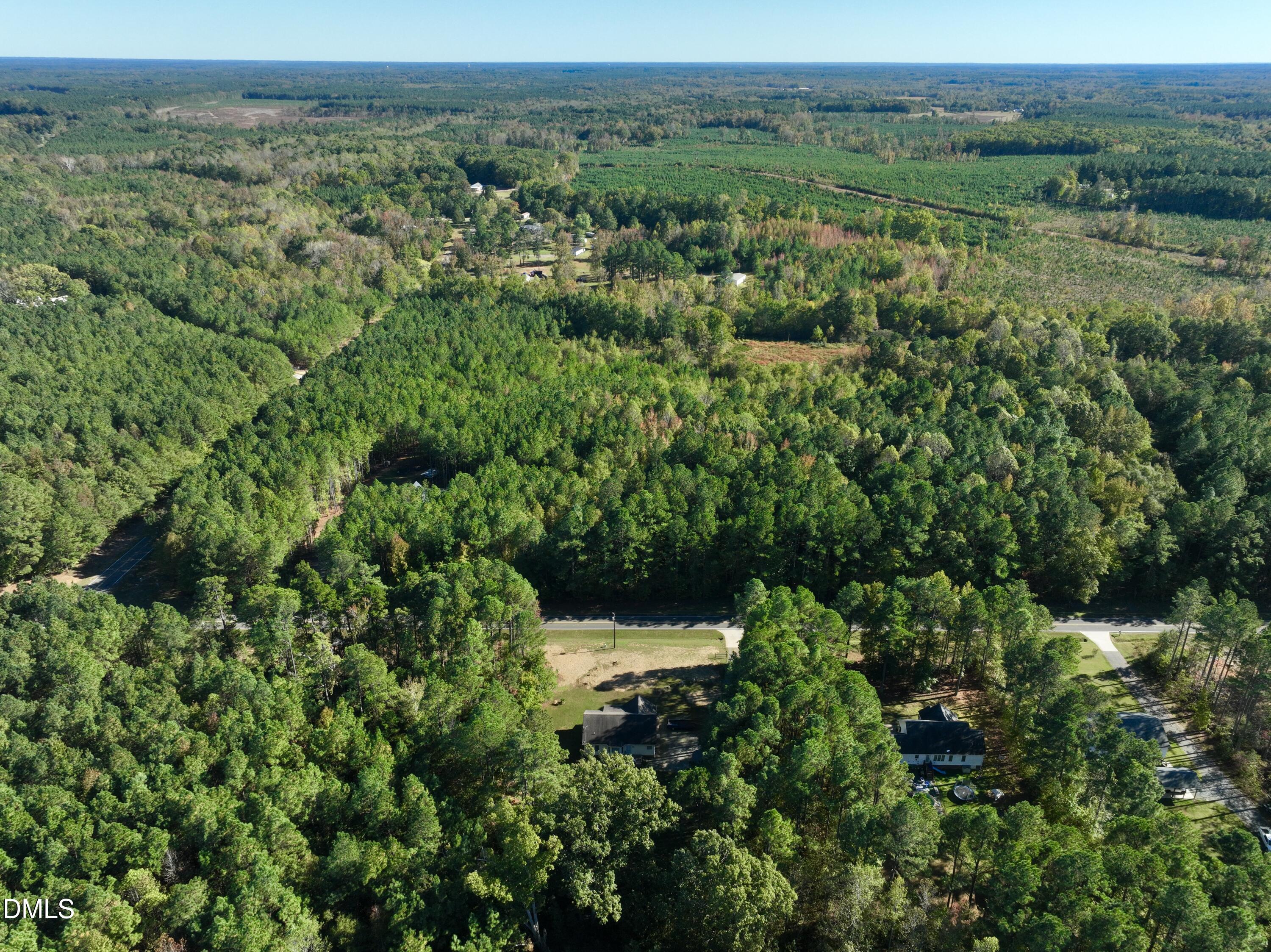2097 Satterwhite Road Oxford, NC 27565 - Photo 35 of 40 an aerial view of residential house with outdoor space and trees all around