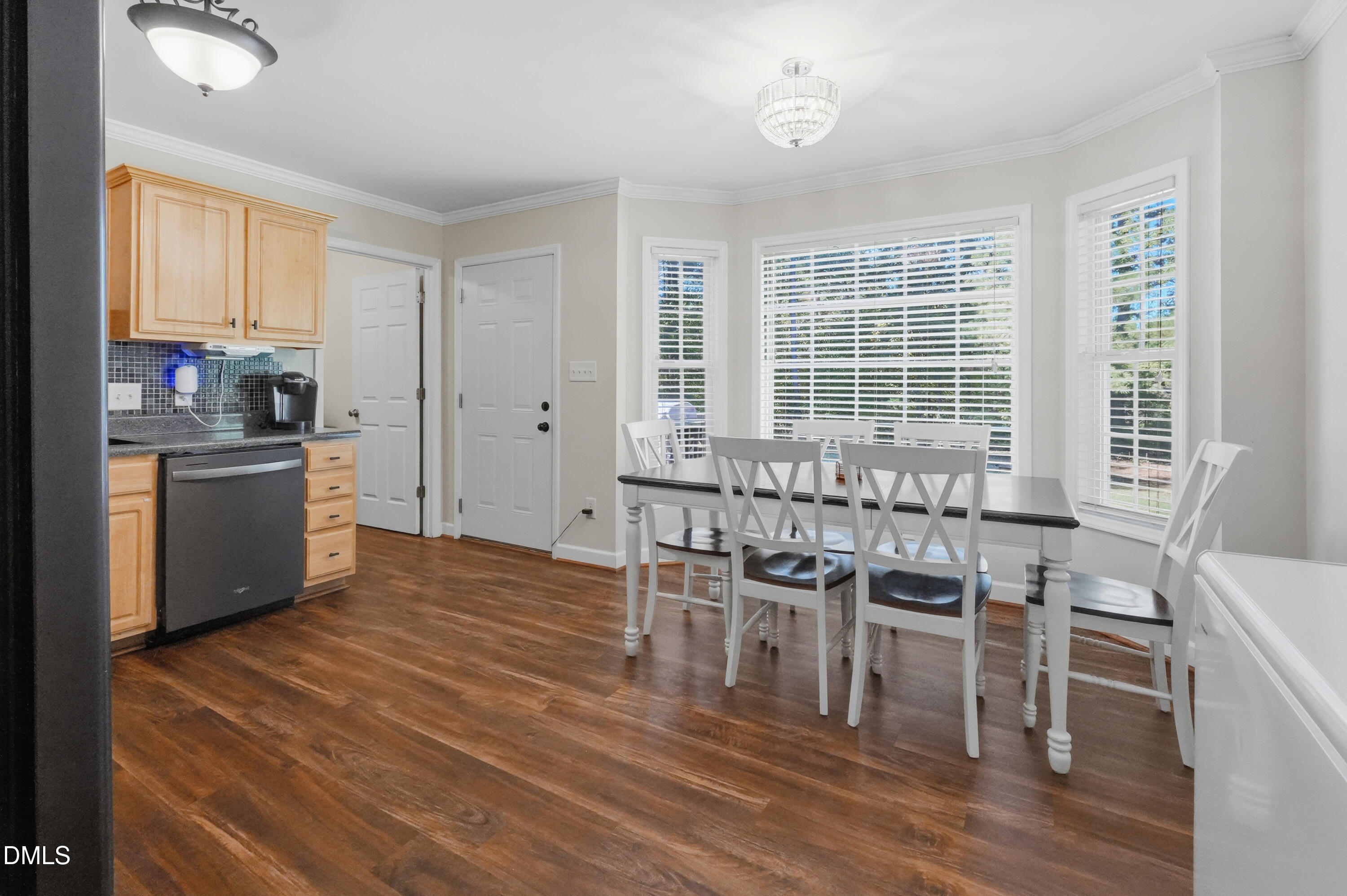 2097 Satterwhite Road Oxford, NC 27565 - Photo 10 of 40 a view of a dining room with furniture and windows