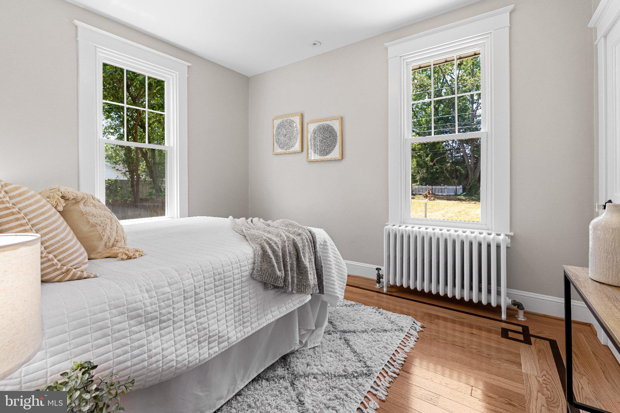 106 Sycamore Road Linthicum Heights, MD 21090 - Photo 20 of 51 a bedroom with a bed and a window