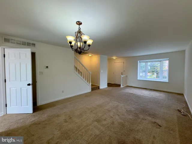 a view of a livingroom with a chandelier
