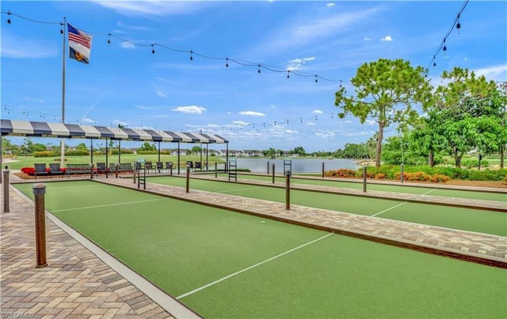 5928 Sand Wedge Lane, Unit 1808 Naples, FL 34110 - Photo 27 of 29 a view of a tennis court