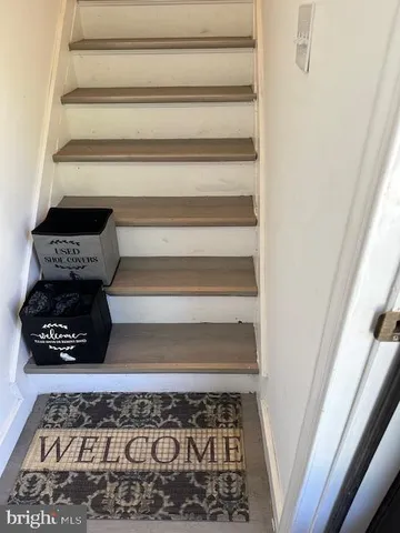 a living room with furniture and window