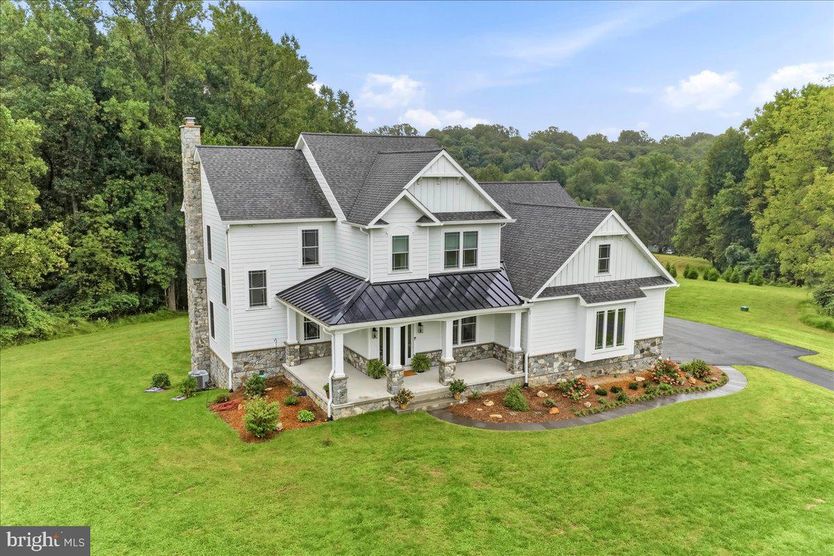 Beautiful Covered Front Porch with Metal Roof