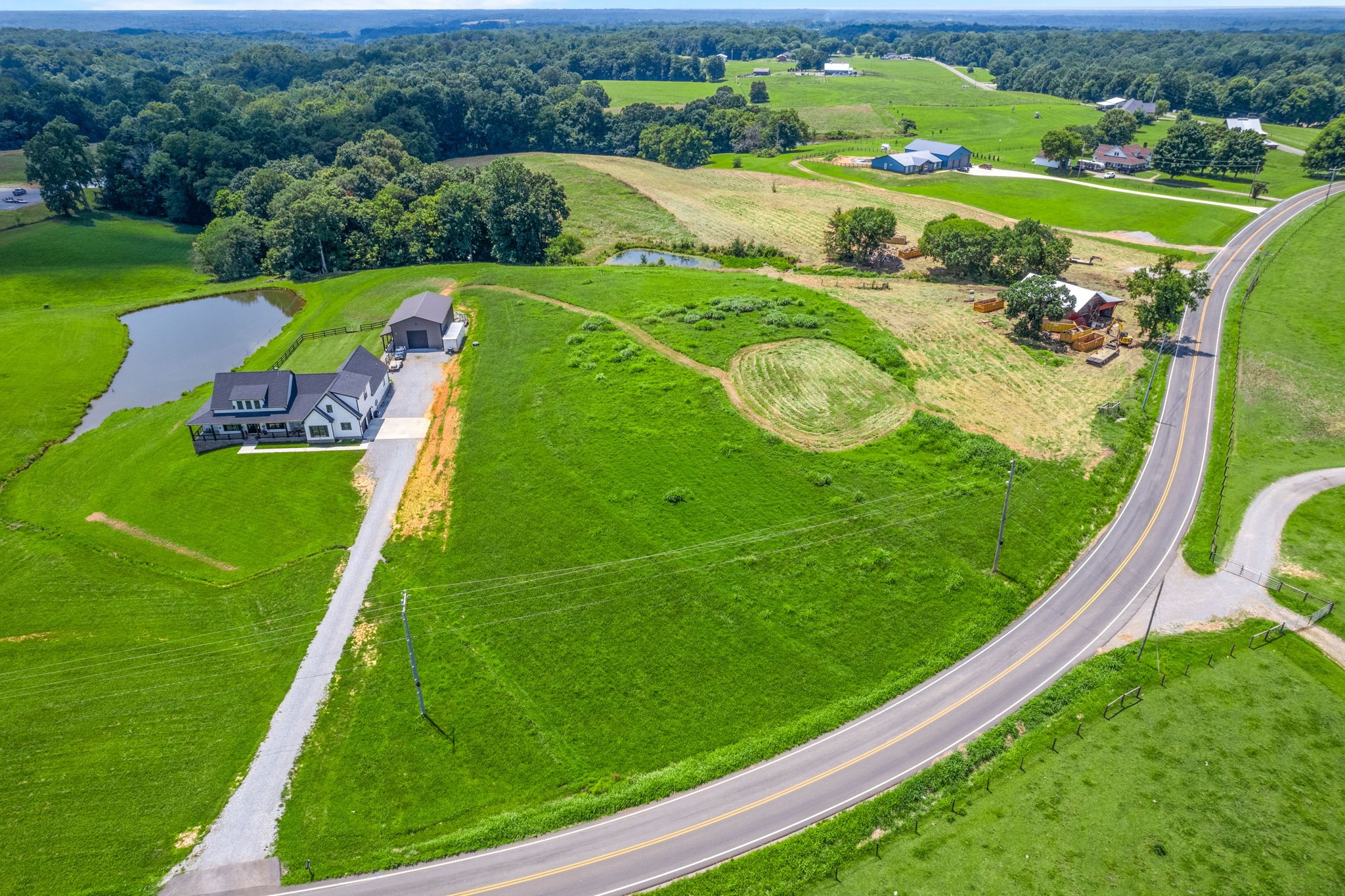 4 Hickory Point Road Clarksville, TN 37043 - Photo 4 of 5 a view of a golf course with a garden