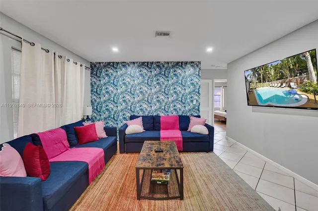 a living room with furniture and a couch