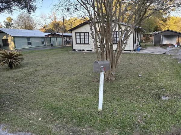 a house view with a outdoor space