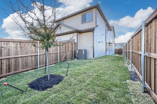 a view of a backyard with green space