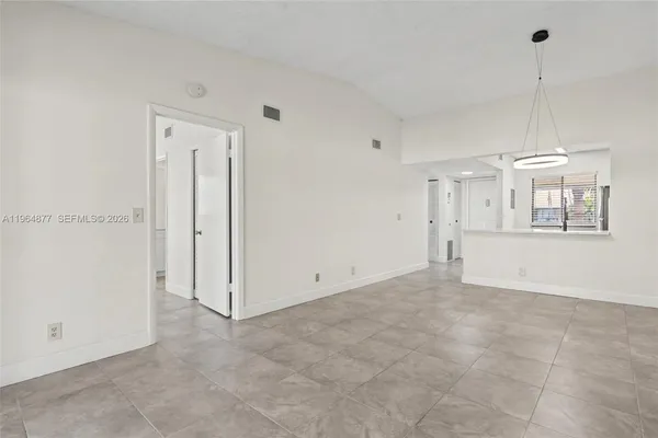 a view of a kitchen with a sink