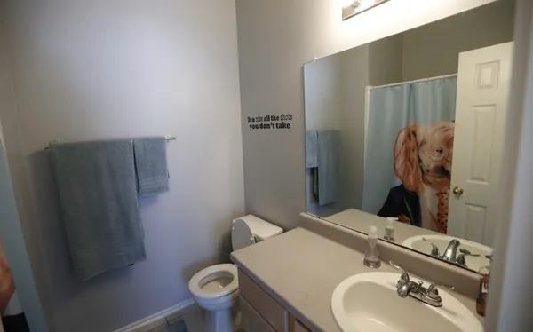 a bathroom with a sink and toilet